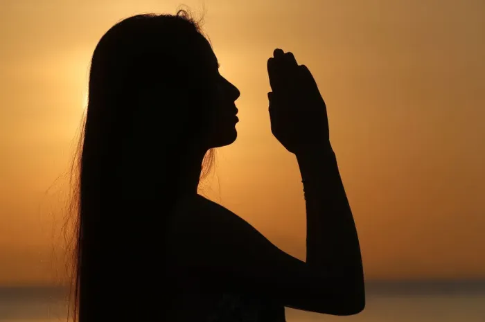 Framed Print : Silhouette of a woman standing by the sea at sunset doing yoga pose and meditation, Kep Framed Print : Silhouette of a woman standing by the sea at sunset doing yoga pose and meditation, Kep
