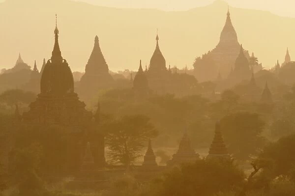 Silhouettes of the temples and pagodas of the old ruined city at dawn, Bagan