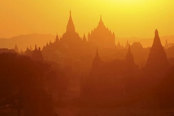 Silhouettes of the temples of the ruined city of Bagan at sunrise, Myanmar, Asia