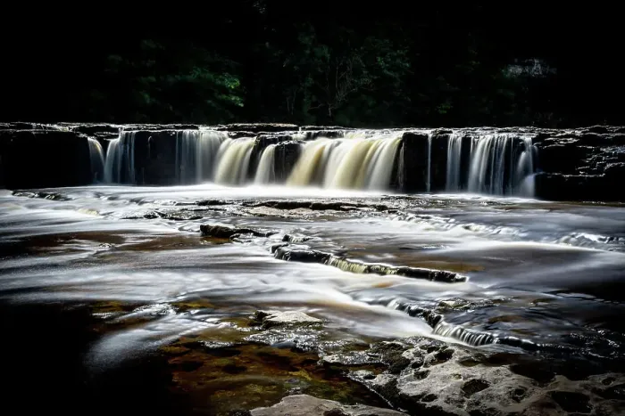 Framed Print : Silky smooth waterfall cascading over rocks with a dark, moody forest backdrop, North Yorkshire, England, United Kingdom, Eurpe Framed Print : Silky smooth waterfall cascading over rocks with a dark, moody forest backdrop, North Yorkshire, England, United Kingdom, Eurpe