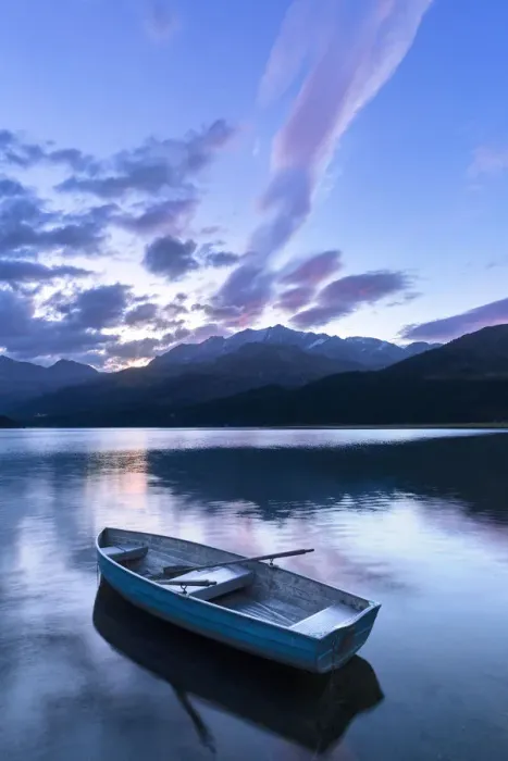 Framed Print : Single moored boat in the Lake of Sils at sunrise, Maloja pass, Engadine valley Framed Print : Single moored boat in the Lake of Sils at sunrise, Maloja pass, Engadine valley