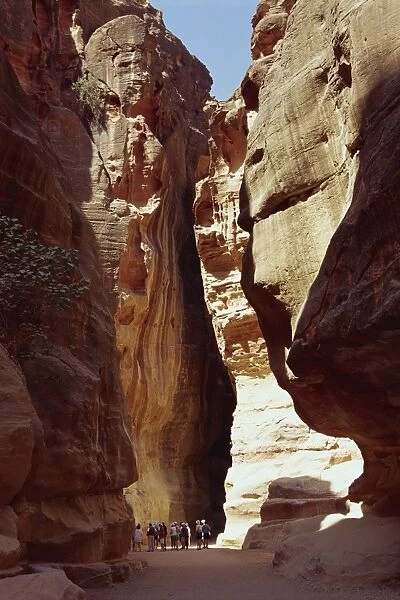 The Siq, narrow entrance between rock cliffs