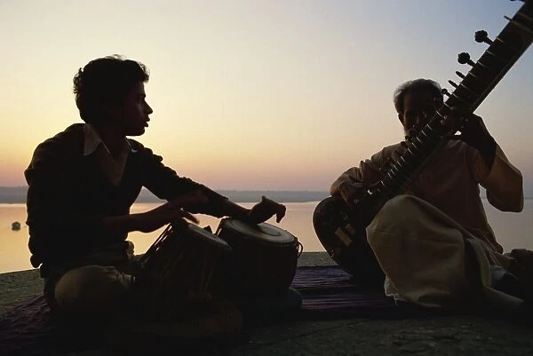 Sitar and tabla player beside the Ganga River, Varanasi, Uttar Pradesh state, India, Asia