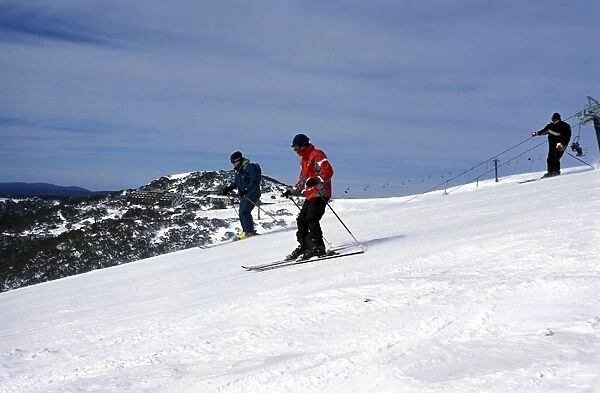 Skiers skiing on slope at Mount Hotham, High Country, Victoria, Australia, Pacific