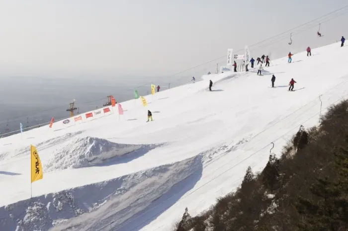 Framed Print : Skiers and snowboarders at Shijinglong ski resort, Beijing, China, Asia