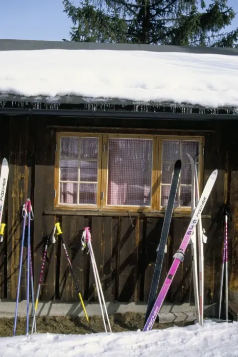 Framed Print : Skis outside wooden building Framed Print : Skis outside wooden building