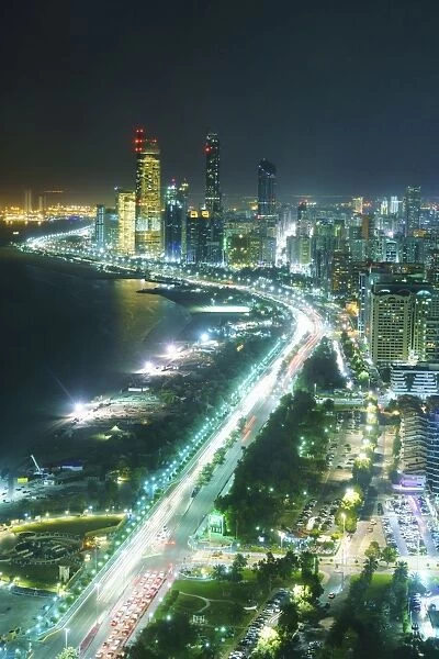 Skyline and Corniche, Al Markaziyah district by night, Abu Dhabi, United Arab Emirates