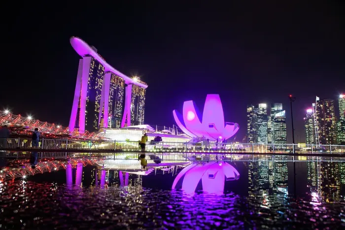 Framed Print : Skyline of Singapore Marina Bay at night with Marina Bay Sands and Art Science museum reflecting in a pond after rain, Singapore Framed Print : Skyline of Singapore Marina Bay at night with Marina Bay Sands and Art Science museum reflecting in a pond after rain, Singapore