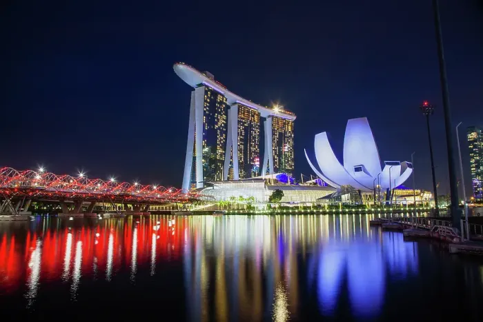 Framed Print : Skyline of Singapore Marina Bay at night with Marina Bay Sands and Art Science museum reflecting in a pond after rain, Singapore Framed Print : Skyline of Singapore Marina Bay at night with Marina Bay Sands and Art Science museum reflecting in a pond after rain, Singapore