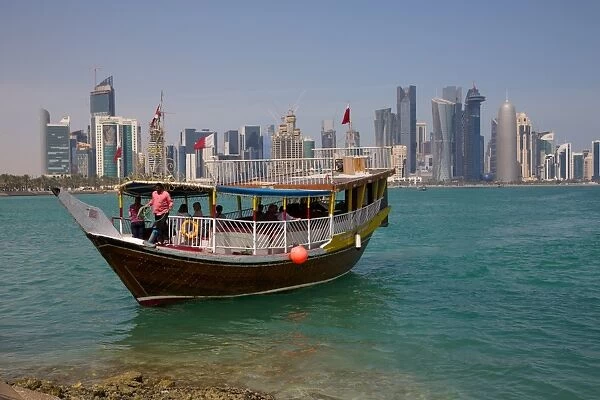 Small boat and City Centre skyline, Doha, Qatar, Middle East