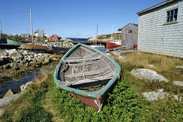 Small boat on land in the lobster fishing community, also a tourist attraction