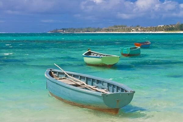 Small fishing boats in the turquoise sea, Mauritius, Indian Ocean, Africa