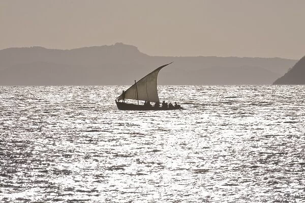 Small sailing boat at sunset near Diego Suarez (Antsiranana), Madagascar