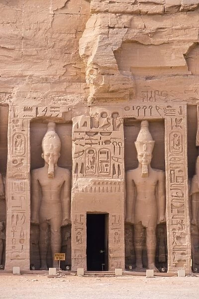 The small temple, dedicated to Nefertari and adorned with statues of the King and Queen