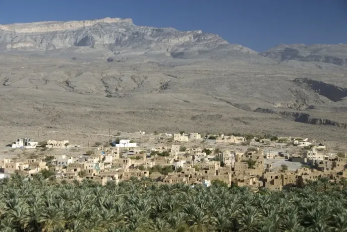 Framed Print : Small town beside its irrigated palmery, Al Hamra, at foot of mountain of Jabal Akhdar Framed Print : Small town beside its irrigated palmery, Al Hamra, at foot of mountain of Jabal Akhdar