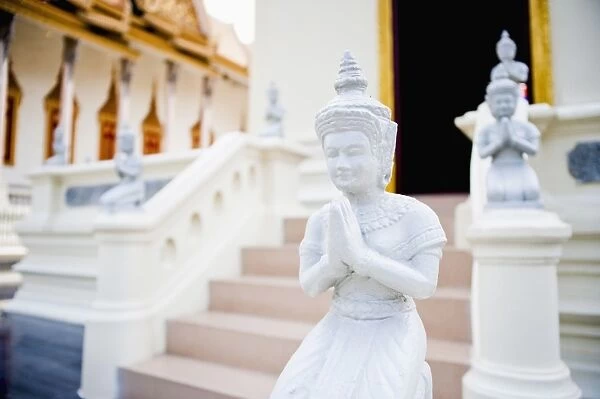 Small white Buddha statue, Temple of the Emerald Buddha at The Royal Palace, Phnom Penh, Cambodia, Indochina, Southeast Asia, Asia