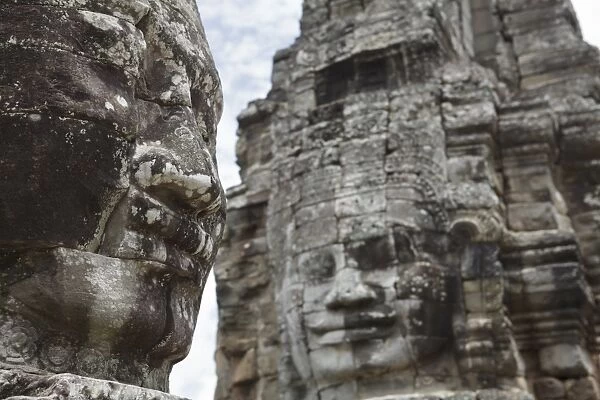 Smiling faces carved in stone, Bayon, Angkor, UNESCO World Heritage Site, Siem Reap, Cambodia, Indochina, Southeast Asia, Asia