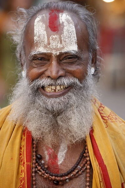 Smiling sadhu with Vishnu mark on his forehead, Rishikesh, Uttarakhand, India, Asia