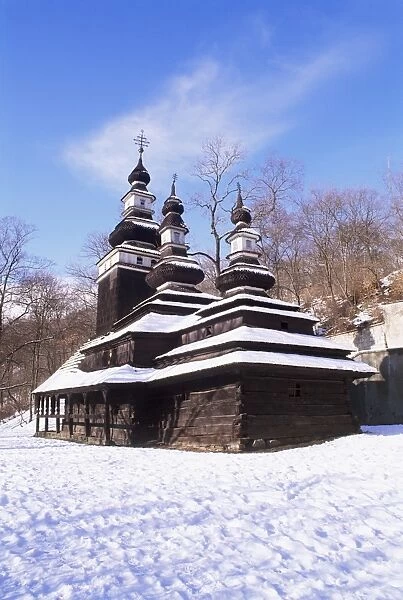 Snow-coverd Christian Orthodox wooden church of St. Michael dating from the 18th century