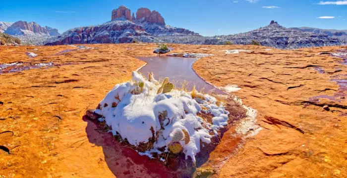 Framed Print : Snow covered Cathedral Rock in Sedona viewed from a sandstone plateau along Secret Slick Framed Print : Snow covered Cathedral Rock in Sedona viewed from a sandstone plateau along Secret Slick