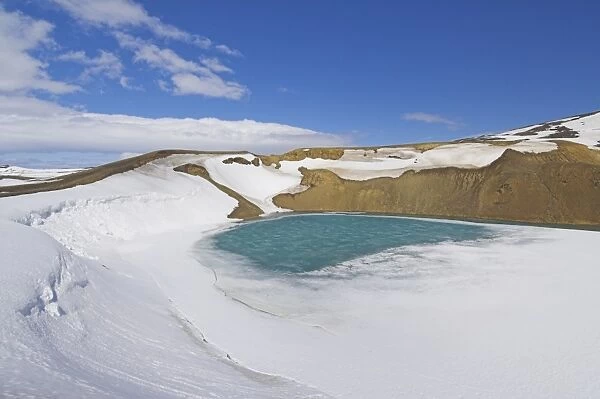 Snow covered frozen Viti (Hell) crater near Krafla power plant