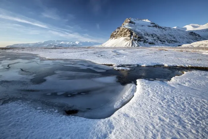 Framed Print : Snow covered landscape in winter with frozen pool, mountain and Vatnajokull Glacier Framed Print : Snow covered landscape in winter with frozen pool, mountain and Vatnajokull Glacier