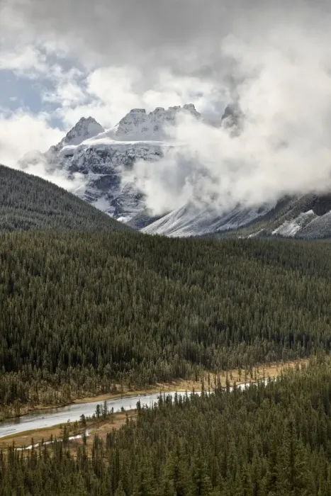 Framed Print : Snow-covered mountains among the clouds above an evergreen forest, Banff National Park, UNESCO World Heritage Site, Alberta, Canada, North America Framed Print : Snow-covered mountains among the clouds above an evergreen forest, Banff National Park, UNESCO World Heritage Site, Alberta, Canada, North America