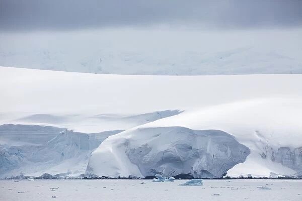 Snow covered mountains and glaciers in Dallmann Bay, Antarctica, Polar Regions