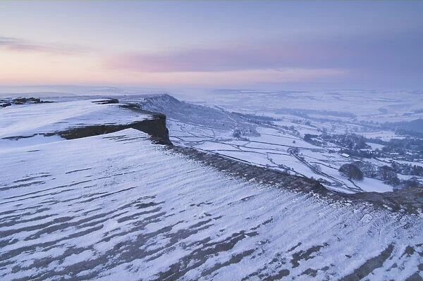 Snow at dawn, Froggatt Edge, Peak District, Derbyshire, England, UK