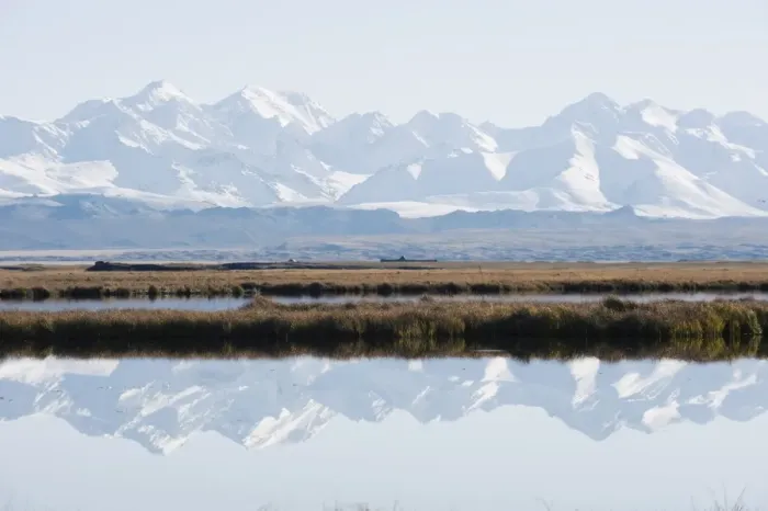 Framed Print : Snow mountains reflected in a lake, Bayanbulak, Xinjiang Province, China, Asia Framed Print : Snow mountains reflected in a lake, Bayanbulak, Xinjiang Province, China, Asia
