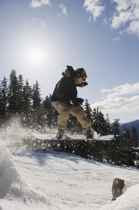 Framed Print : A snowboarder jumping at Whistler mountain resort, venue of the 2010 Winter Olympic Games Framed Print : A snowboarder jumping at Whistler mountain resort, venue of the 2010 Winter Olympic Games