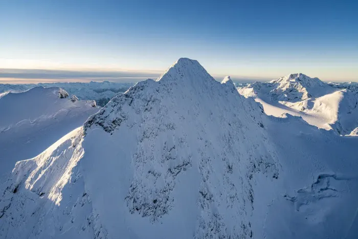 Framed Print : Snowcapped rock face of Monte Disgrazia and Piz Gluschaint in winter, aerial view Framed Print : Snowcapped rock face of Monte Disgrazia and Piz Gluschaint in winter, aerial view