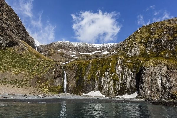 Snowmelt waterfall in Hercules Bay, South Georgia, Polar Regions