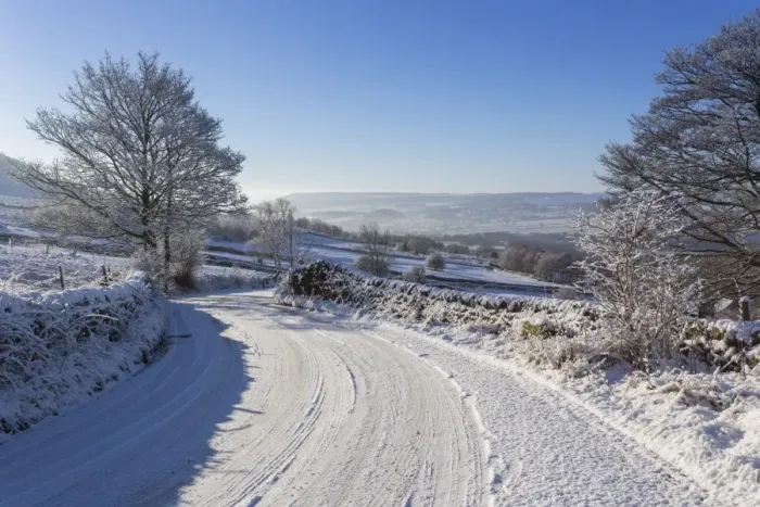 Framed Print : Snowy, bendy country lane with stone walls and trees, Curbar Edge, Peak District National Park, Derbyshire, England, United Kingdom, Europe Framed Print : Snowy, bendy country lane with stone walls and trees, Curbar Edge, Peak District National Park, Derbyshire, England, United Kingdom, Europe