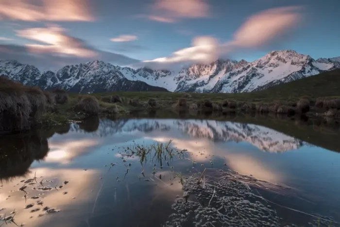 Framed Print : Snowy peaks and pink clouds reflected in water at dawn, Tombal, Soglio, Bregaglia Valley Framed Print : Snowy peaks and pink clouds reflected in water at dawn, Tombal, Soglio, Bregaglia Valley