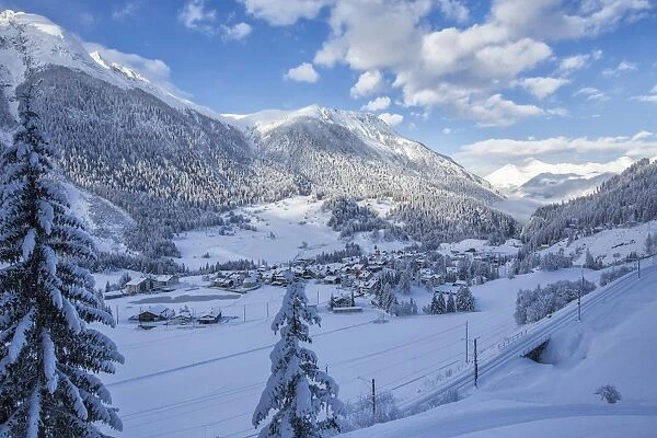The snowy village of Filisur, Canton of Grisons (Graubunden), Switzerland, Europe