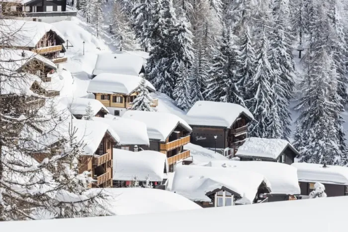 Framed Print : The snowy woods frame the typical mountain huts, Bettmeralp, district of Raron, canton of Valais Framed Print : The snowy woods frame the typical mountain huts, Bettmeralp, district of Raron, canton of Valais