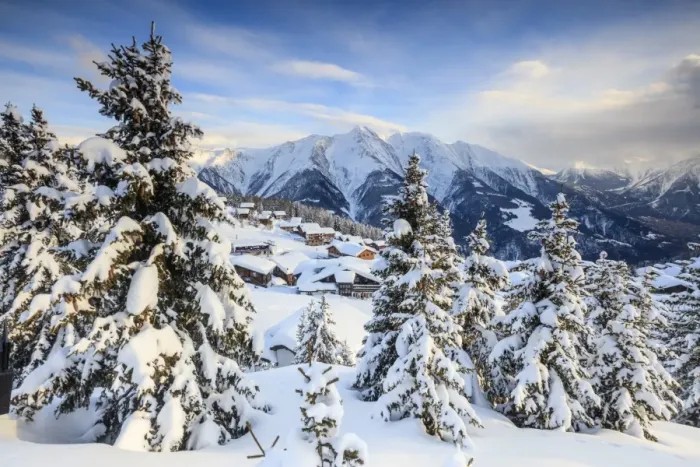 Framed Print : Snowy woods and mountain huts framed by the winter sunset, Bettmeralp, district of Raron Framed Print : Snowy woods and mountain huts framed by the winter sunset, Bettmeralp, district of Raron