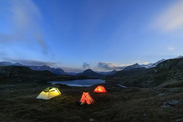 The soft lights of the tents light up dusk, Minor Valley, High Valtellina, Livigno