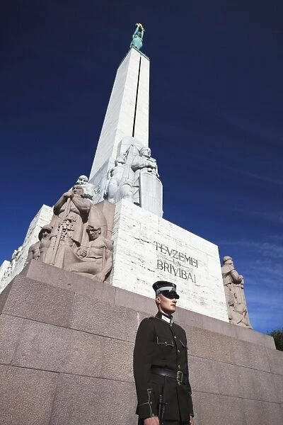 Soldier guarding Freedom Monument, Riga, Latvia, Baltic States, Europe