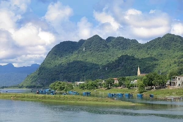 Son River and Catholic Church in the Phong Nha Ke Bang National Park, Quang Binh
