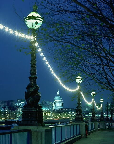 South Bank street lamps and city skyline, including St. Pauls Cathedral