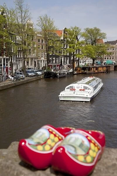Souvenir clogs and canal, Amsterdam, Holland, Europe