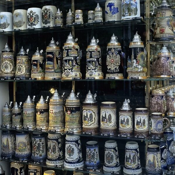 Souvenir shop-window displaying traditional Austrian beer tankards, Vienna, Austria, Europe