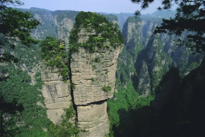 Framed Print : Spectacular limestone outcrops and forested valleys of Zhangjiajie Forest Park in the Wulingyuan Scenic Area, Hunan Framed Print : Spectacular limestone outcrops and forested valleys of Zhangjiajie Forest Park in the Wulingyuan Scenic Area, Hunan