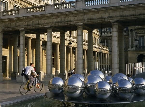 Sphere sculpture in courtyard of the Palais Royal, Paris, France, Europe