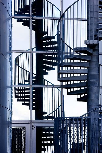 Spiral staircase and its reflection outside Perlan, a modern building housing the Saga Museum