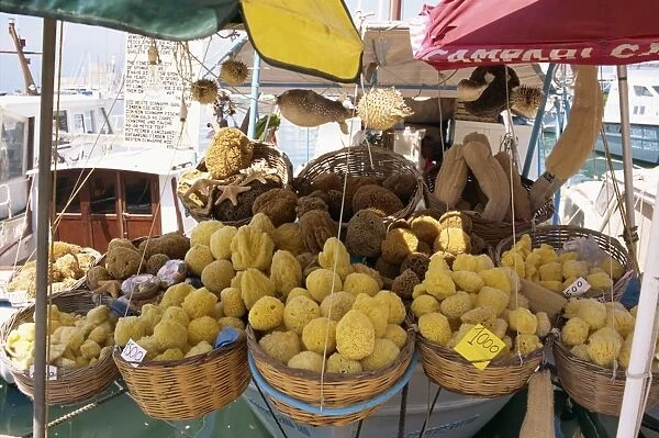 Sponges for sale on a stall on the quayside on the island of Rhodes