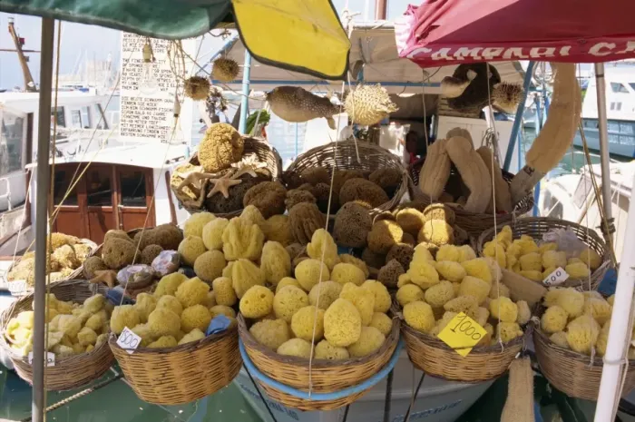 Framed Print : Sponges for sale on a stall on the quayside on the island of Rhodes