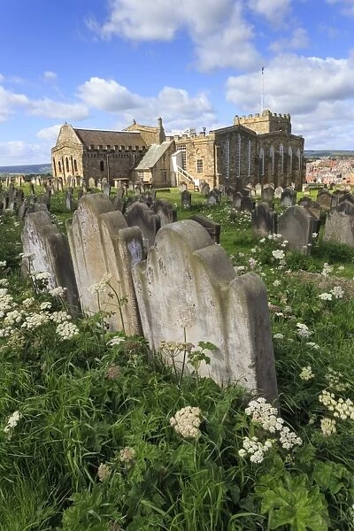 St. Marys Church, gravestones in churchyard surrounded by cow parsely flowers in spring